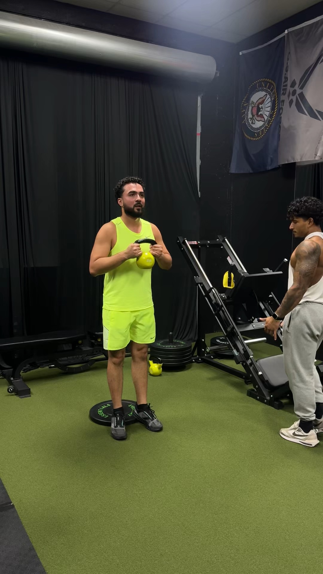 Johnny coaching a strength workout